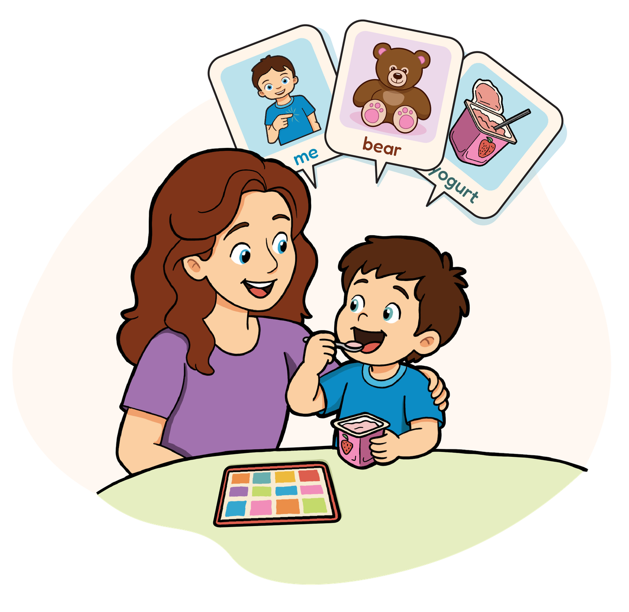 Parent feeding a toddler yogurt with picture-word cards for 'me', 'bear' and 'yogurt' above them and a communication board on the table